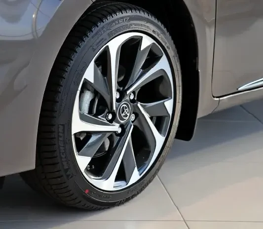Refinished machined-face alloy wheel at the System X Car Polish workshop in Dubai